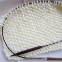 Knit with size 9 needles, a little bit larger than recommended.